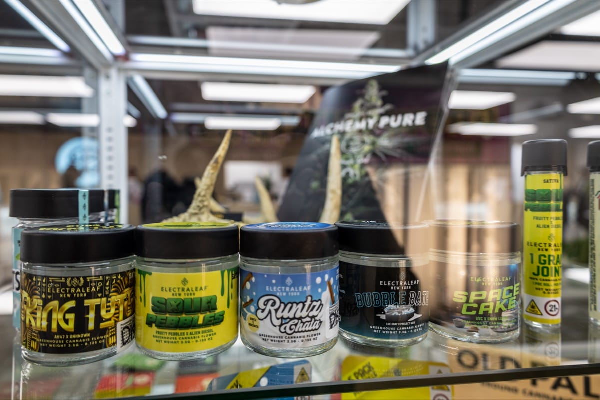 Lab-tested cannabis flower jars on display at Beleaf dispensary